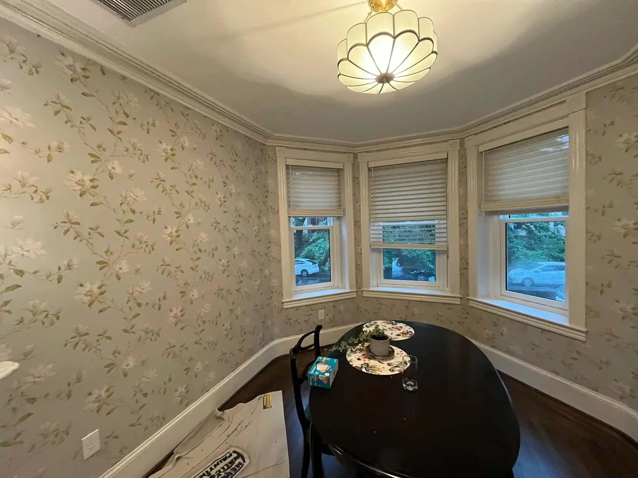 Soft floral wallpaper in a dining room